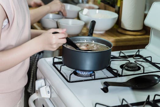 Image of a boiling pot on a stove