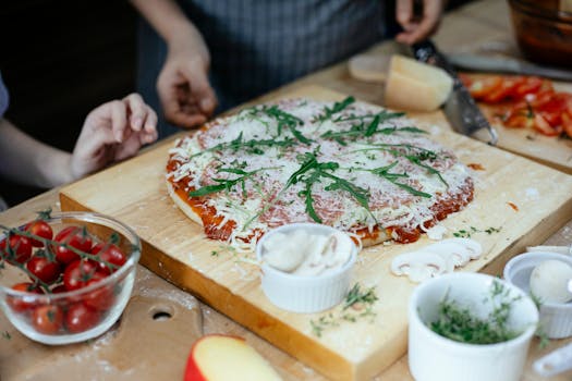 Pizza dough rising in a bowl