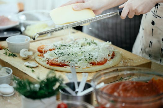 Pizza making process with toppings